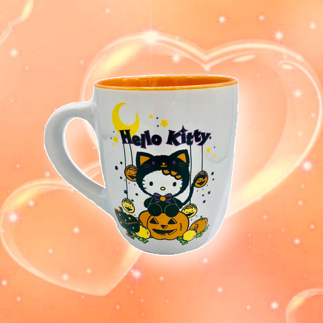 Hello Kitty black cat costume on pumpkin mug